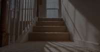 image of a clean carpeted
staircase